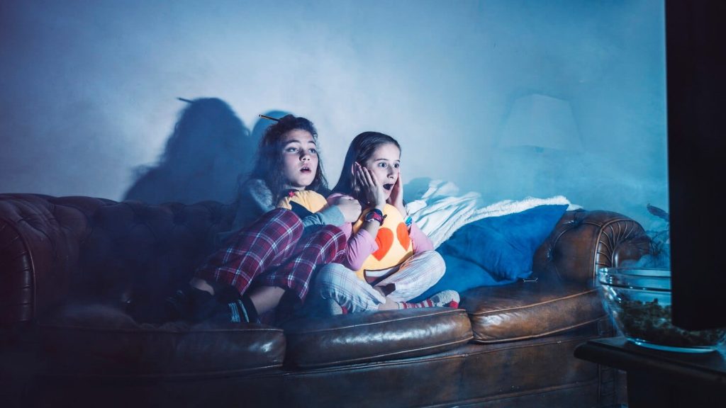 watching television