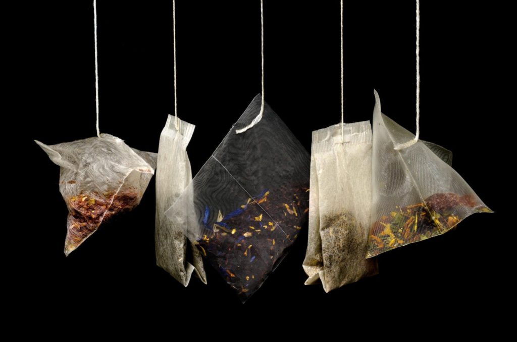 assorted tea bags hanging