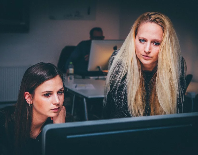 2 young girls working together