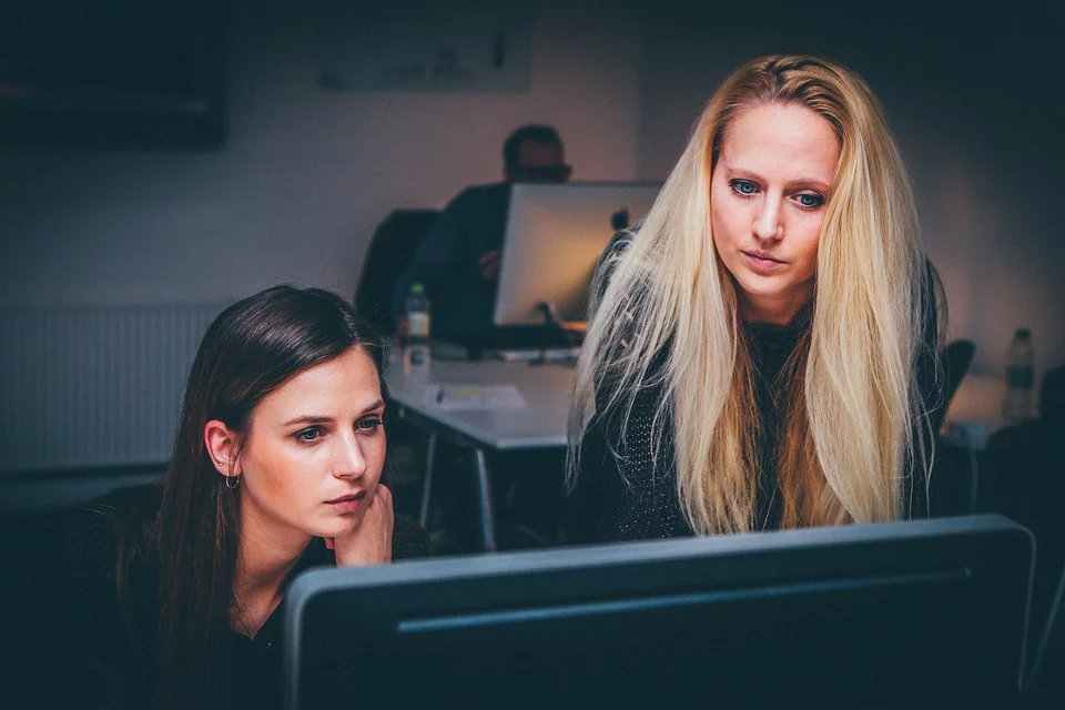 2 young girls working together